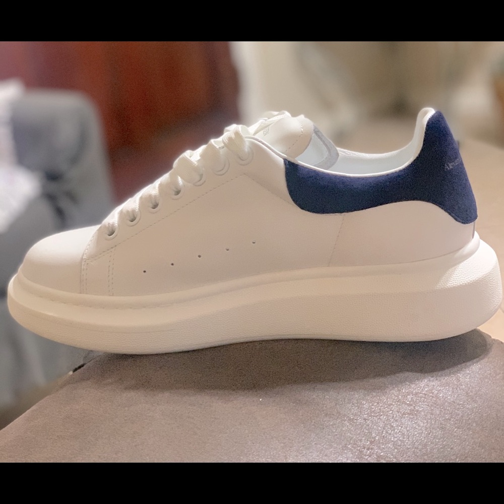 NWOT Men’s Alexander McQueen leather tennis shoes.